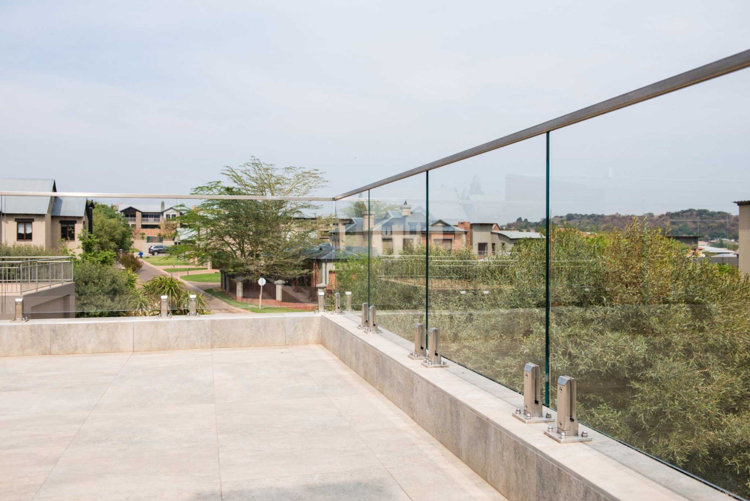 outdoor framed glass balustrades in a private residence